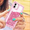 Woman holding pink iPhone bling case outdoor